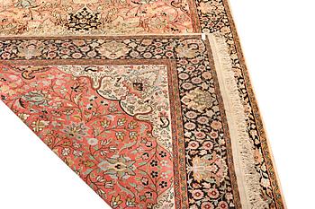 A silk Kashmar carpet, c. 280 x 177 cm.