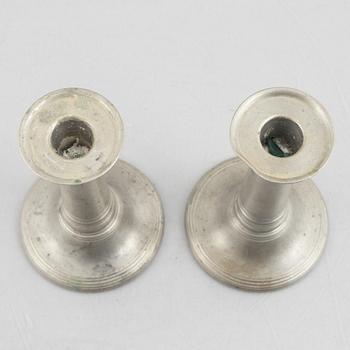 A pair of pewter candle sticks, model A702, Firma Svenskt Tenn, Sweden, 1928.