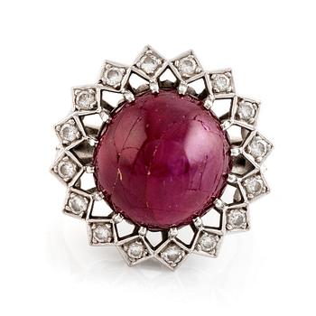 Ring, Strömdahls, with a cabochon-cut ruby and brilliant cut diamonds.