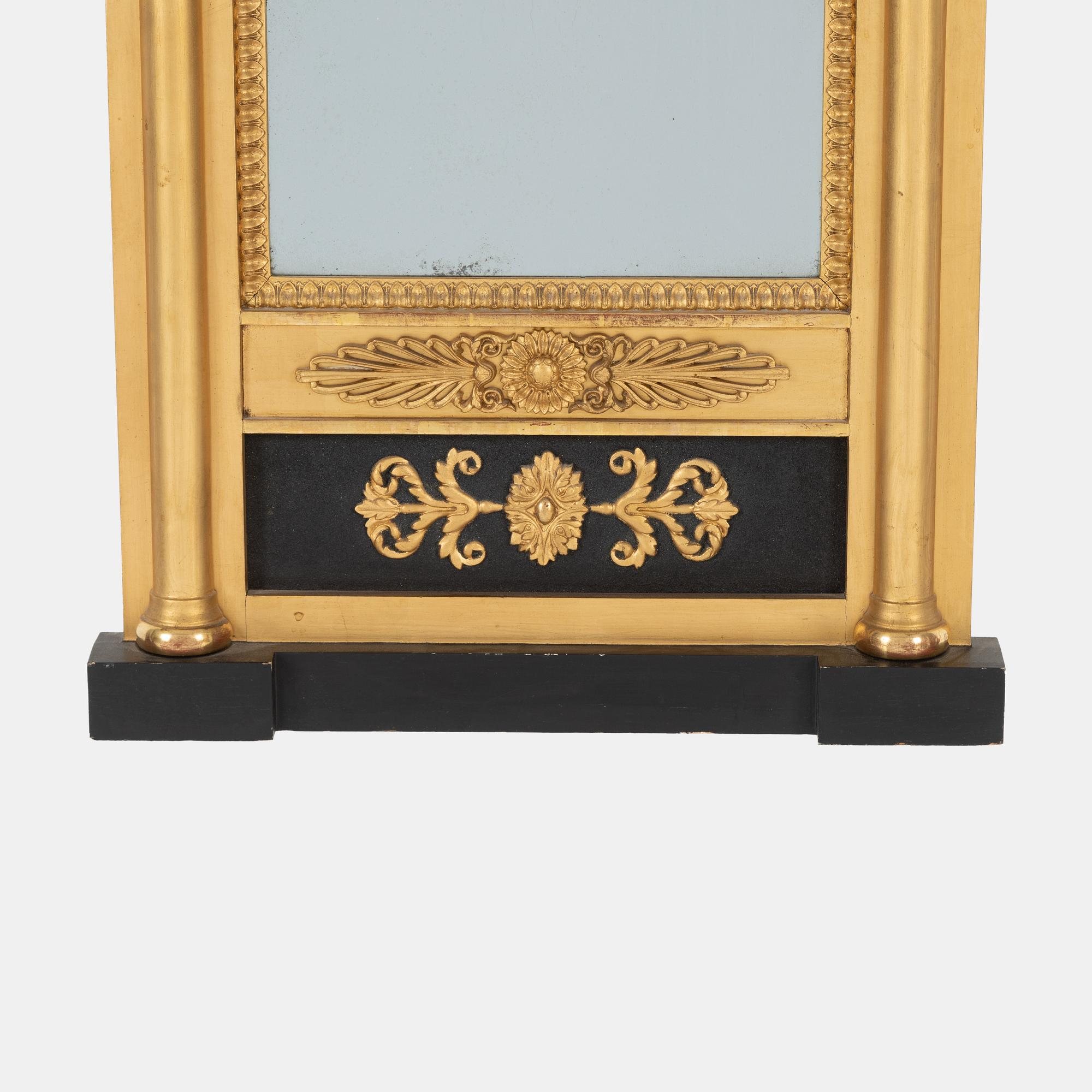 A Swedish Empire mirror, first half of the 19th Century.