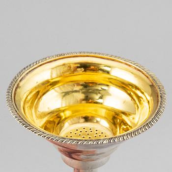 A Swedish 19th century parcel-gilt silver wine-strainer, mark of Adolf Zethelius, Stockholm 1839.