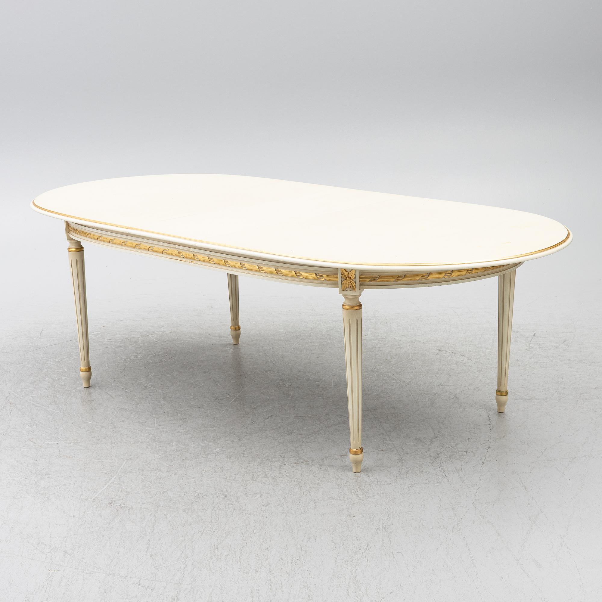 Dining table and armchair, Louis XVI style. Italy, second half of the 20th century.