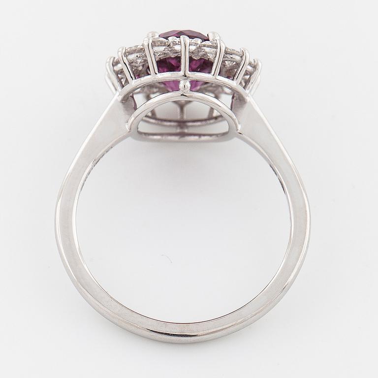 A rhodolite garnet and brilliant cut diamond ring.