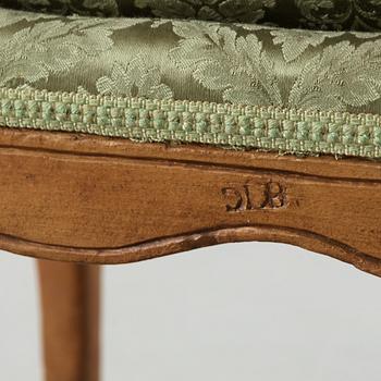 A pair of Louis XV 18th century armchairs.