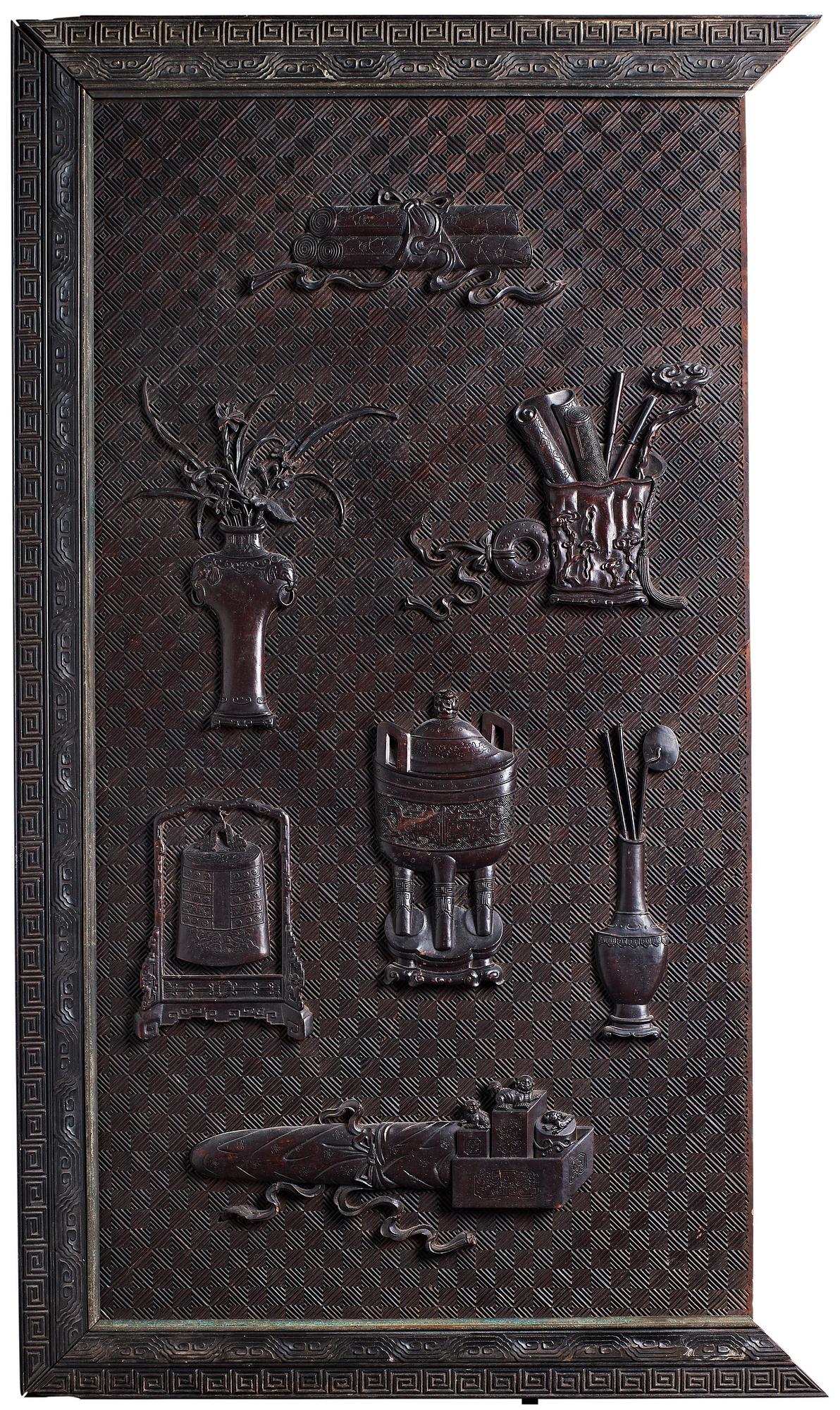 A carved wooden panel, Qing dynasty (1664-1912).