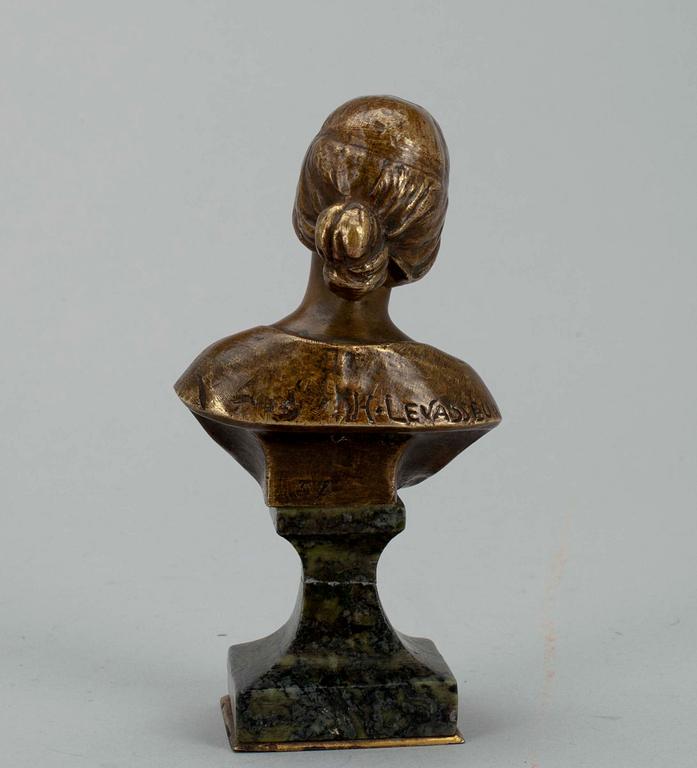 HENRI LOUIS LEVASSEUR, skulptur, brons samt sten, sign. och numr. 34.