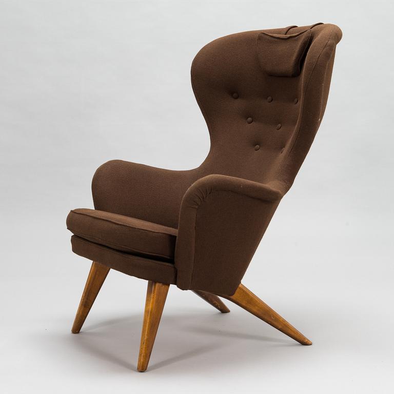 Carl Gustaf Hiort af Ornäs, A mid-20th-century armchair 'Siesta' manufacturer Puunveisto Oy - Träsnideri Ab, Finland.