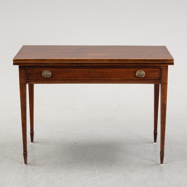 A mid 19th Century mahogany card table.