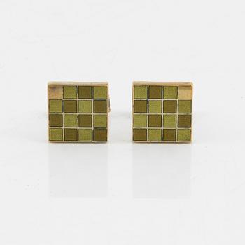 Louis Vuitton, a pair of gold plated silver cufflinks.