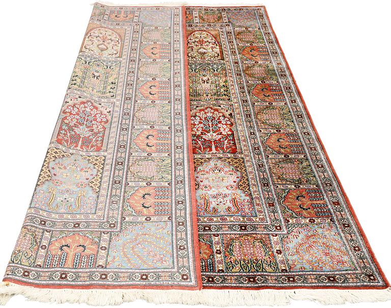 A silk Kashmir rug, c 247 x 161 cm.