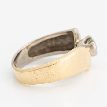 Ring 18K guld med en rund briljantslipad diamant.