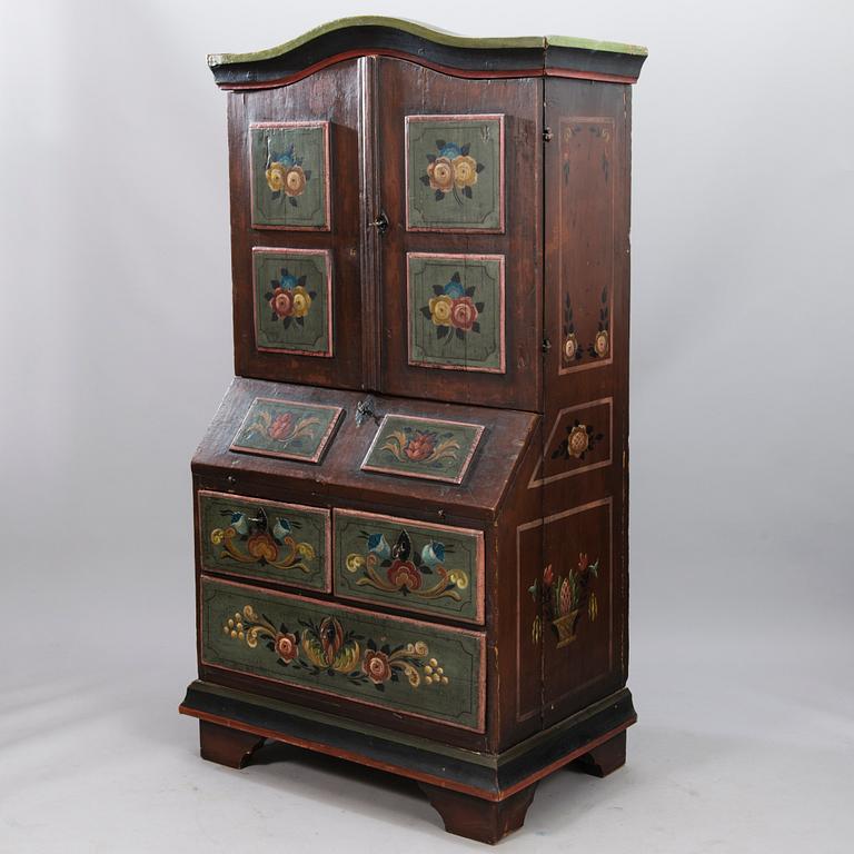 A painted 19th Century folk art bed cabinet.