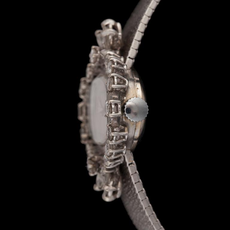 A Tiffany & co ladies wristwatch. Circa 1960- 70. Bezel set with brilliant- and navette-cut diamonds.