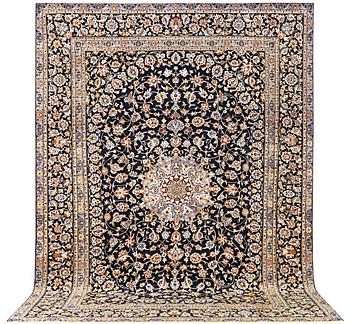 A Kashan carpet, c. 413 x 308 cm.