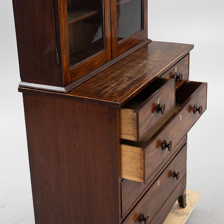 A 19th Century matced mahogany veneered cabinet.