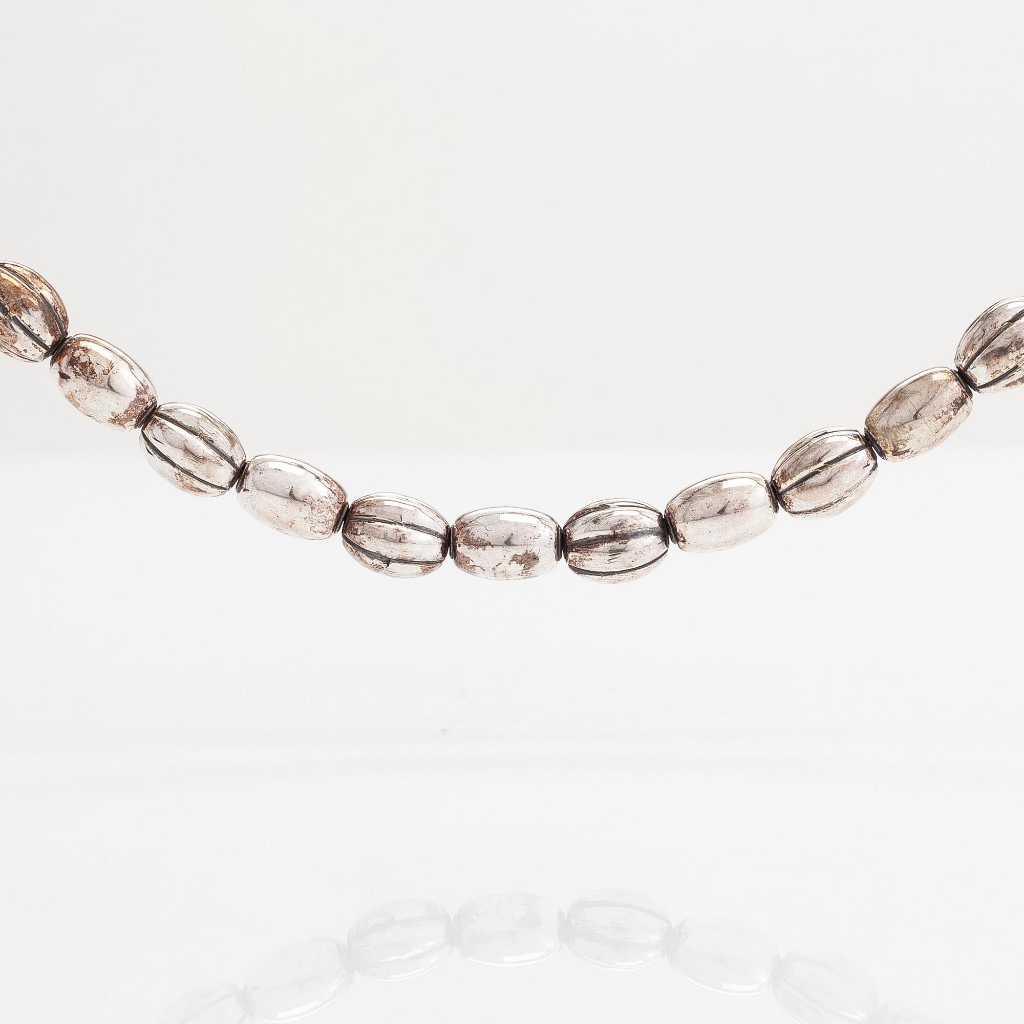 A silver necklace "Halikko treasure" for Kalevala Koru, Helsinki 1968.