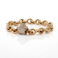 18K gold bracelet with a diamond.