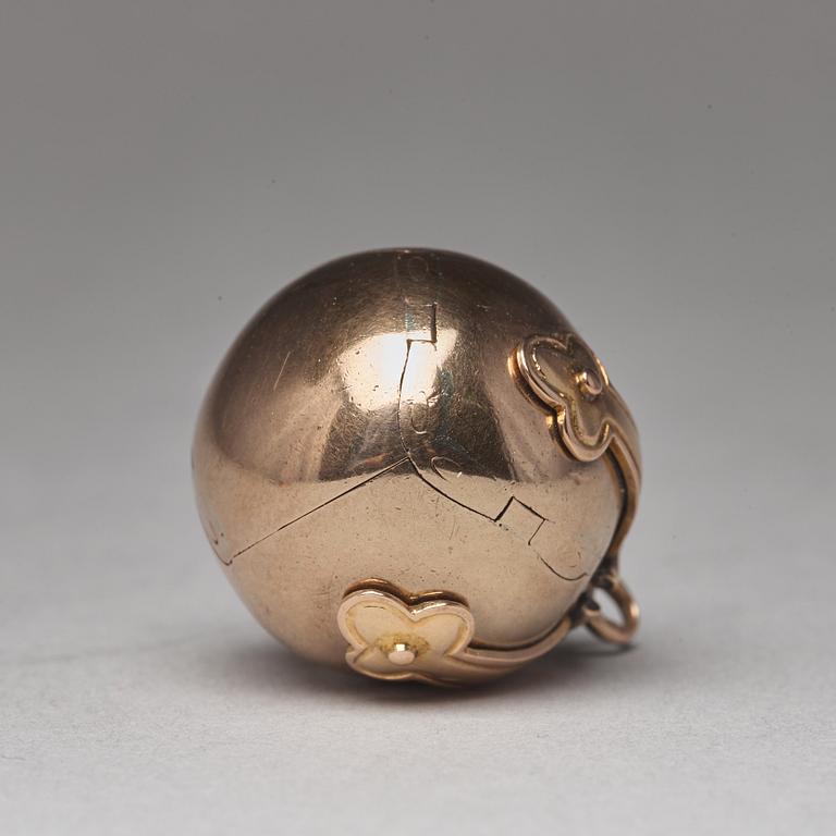 A gold and silver Masonic ball and cross pendent and a Freemason sign, unmarked c:a 1900.