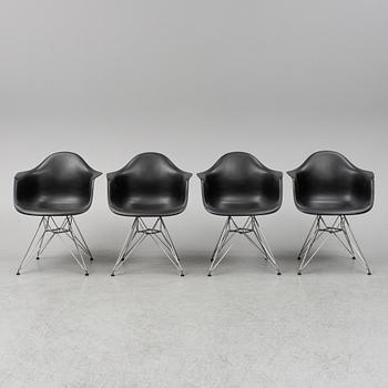 CHARLES AND RAY EAMES,  4  Eames Plastic Armchair, Vitra 2010.