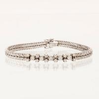 Bracelet 18K white gold with round brilliant cut diamonds.