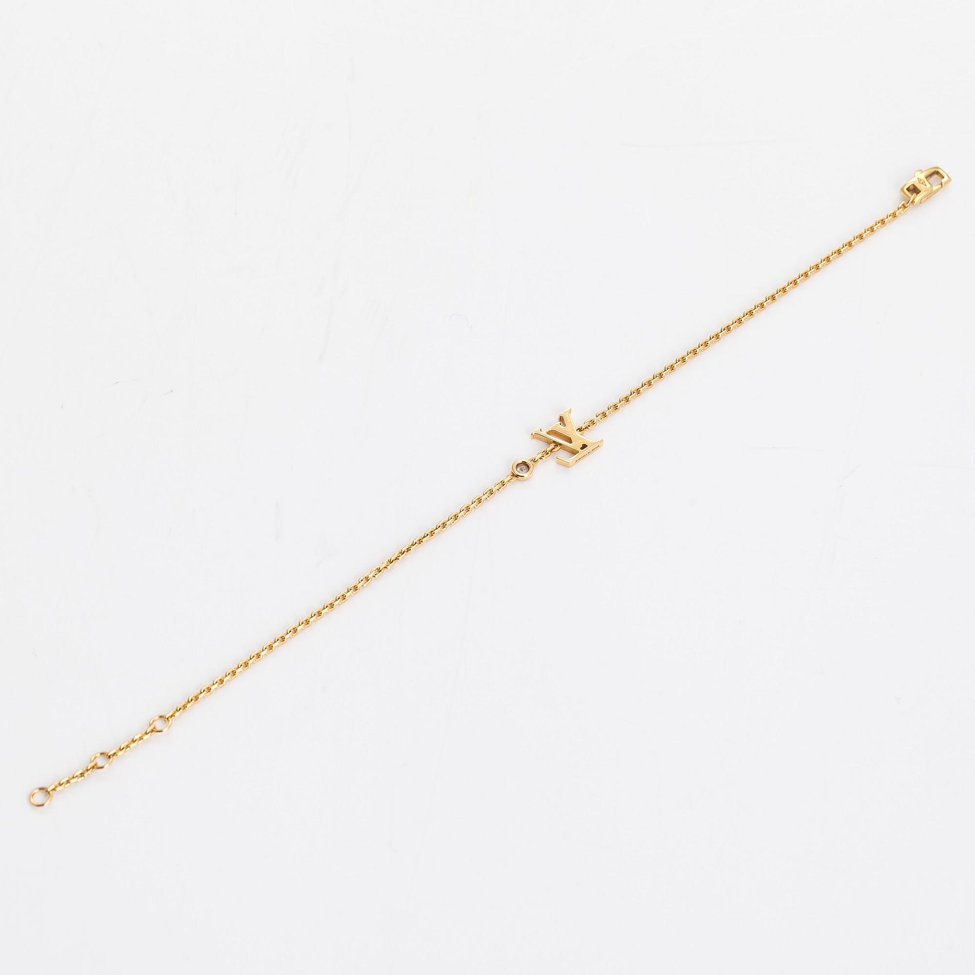 Louis Vuitton, an 18K gold 'Idylle Blossom LV' bracelet with a diamond.