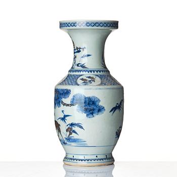 A blue and white and iron red vase. Qing dynasty, 19th century.