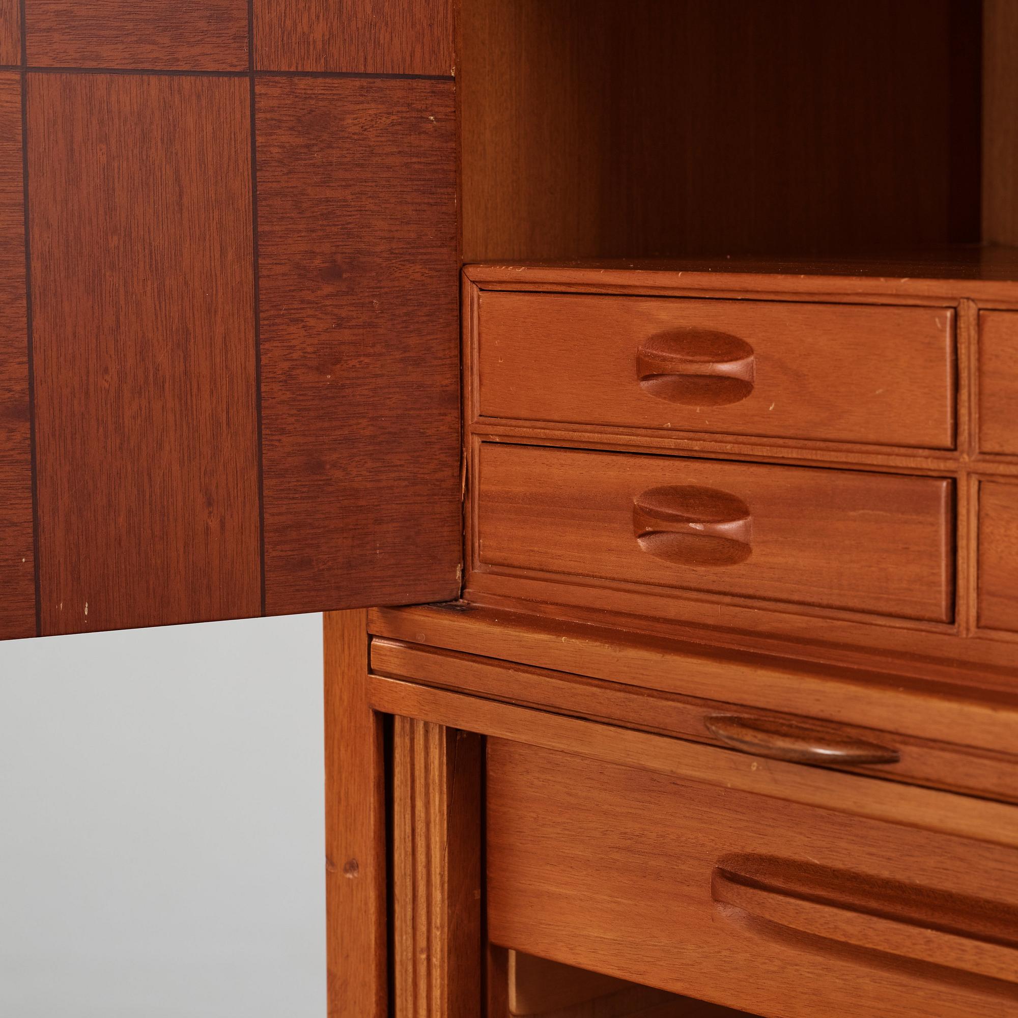 David Rosén, a mahogany and teak cabinet, for Stockholm's Association of Crafts, signed and dated 1959.