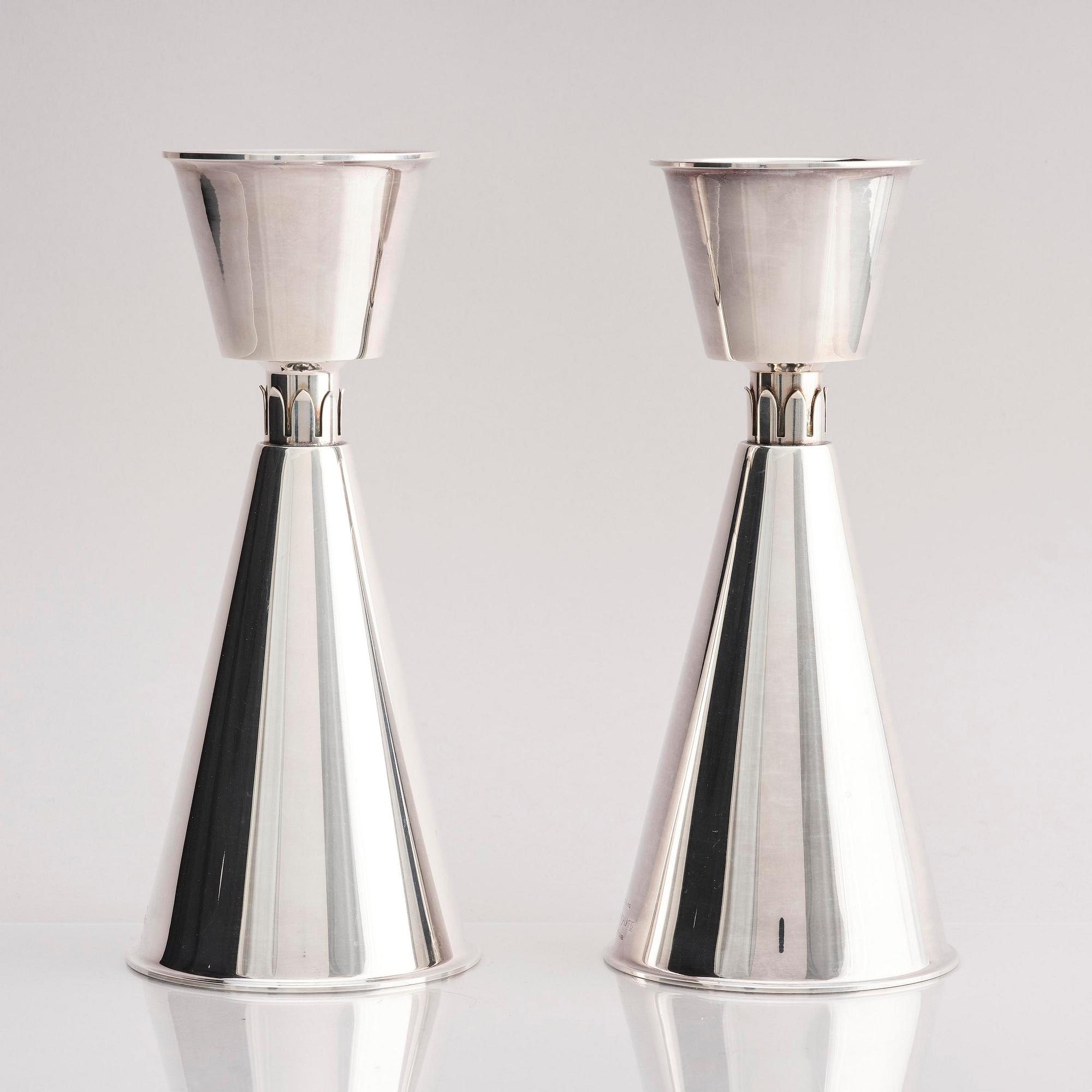 Guldsmedsaktiebolaget (GAB), a pair of sterling silver candlesticks, design Vera Ferngren, Stockholm, Sweden 1968.