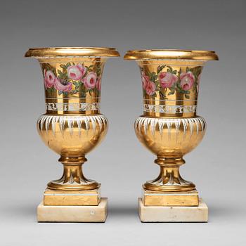 A pair of French urns, 19th Century.