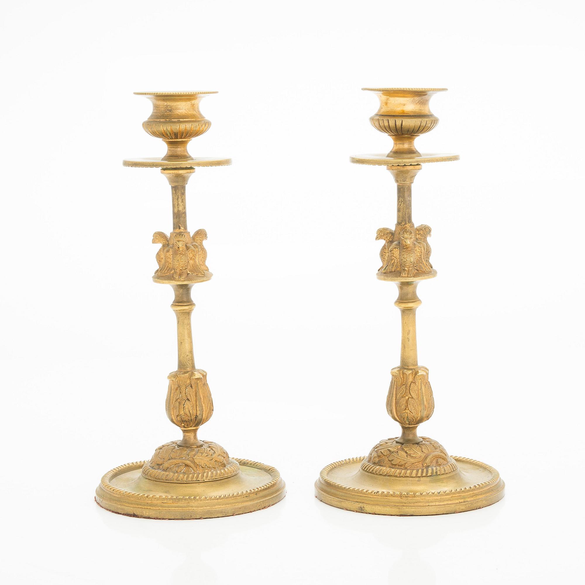 A pair of early 20th century candlesticks.