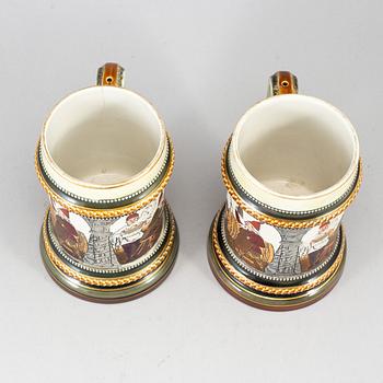 A pair of majolica tankards, Rörstrand, early 20th century.