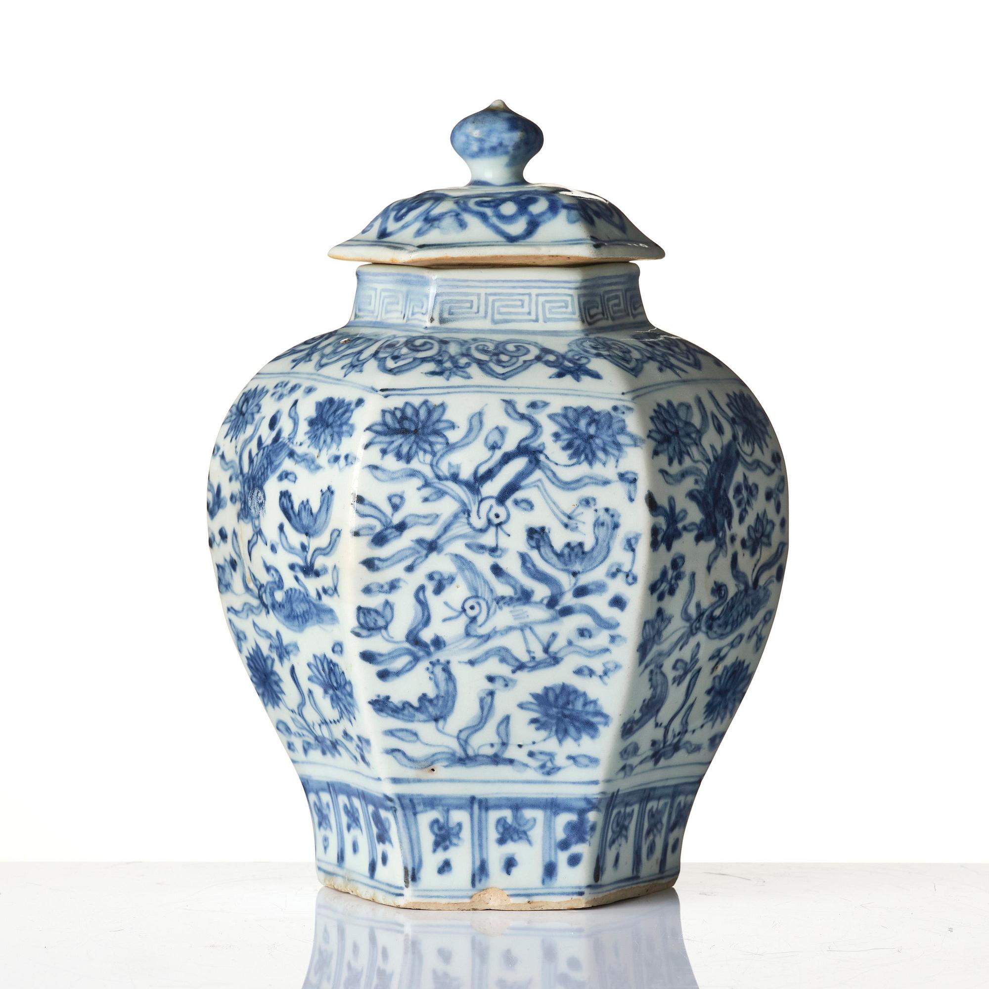 A blue and white faceted 'lotus and birds' jar with cover, Ming dynasty (1368-1644).