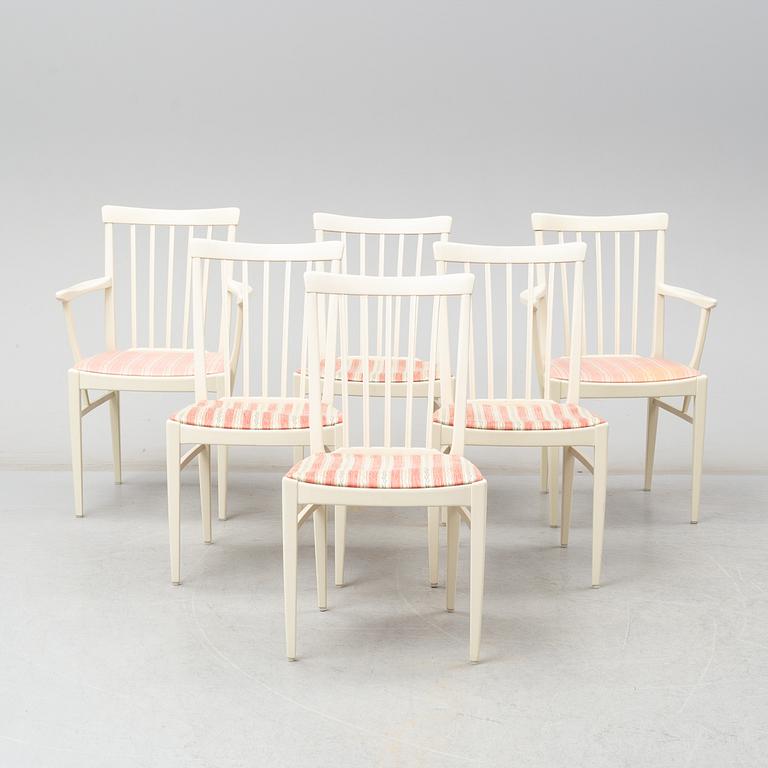 A dining table with four chairrs and two armchairs by Carl Malmsten from Åfors.