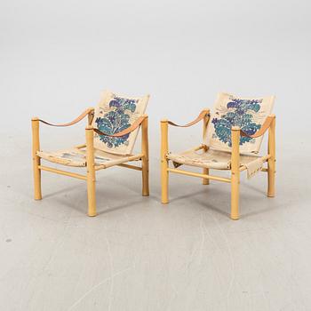 Elias Svedberg, a pair of Safari armchairs from Triva, NK (Nordiska kompaniet) later part of the 20th century.