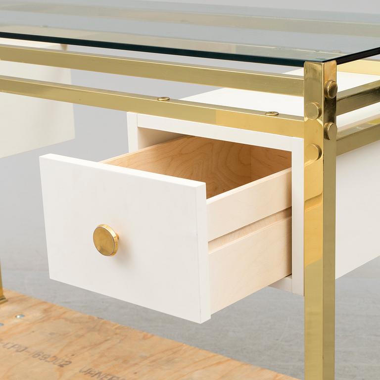 A 1980's dressing table with glasstop.