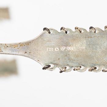 A set of fourteen Swedish silver spoons and server, including with mark of CO Persson Ab, Haparanda 1957.