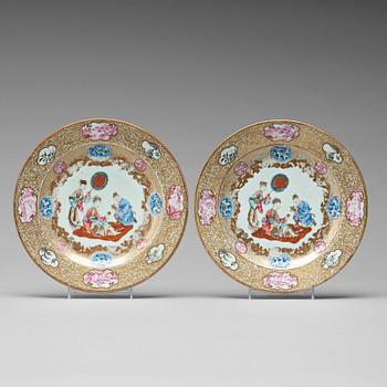 A pair of famille rose dishes with an elegant lady, Qing dynasty, Yongzheng (1723-35).