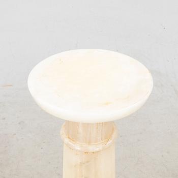An alabaster pedestal later part of the 20th century.