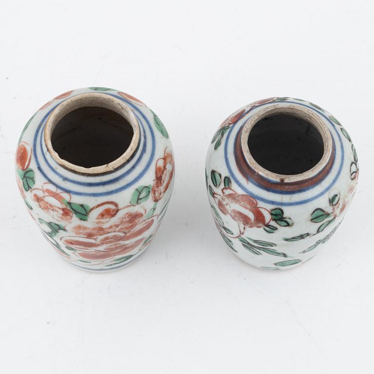 A pair of porcelain miniature urns, China, Ming dynasty, (1364-1644).