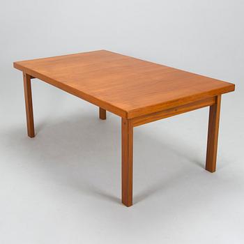 A mid-20th century dining table.