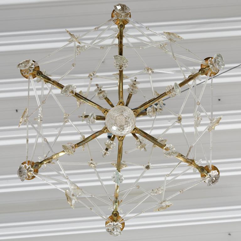 A seven-light gilt brass and cut glass rococo chandelier, mid 18th century.