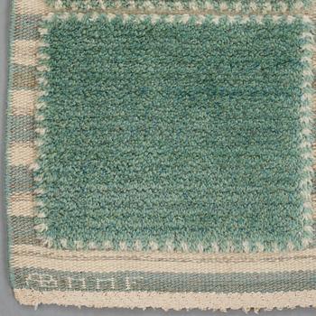 Barbro Nilsson, A carpet, "Gyllenrutan grön", knotted pile in relief ca 240,5-241,5 x 135,5-138 cm, signed AB MMF BN.