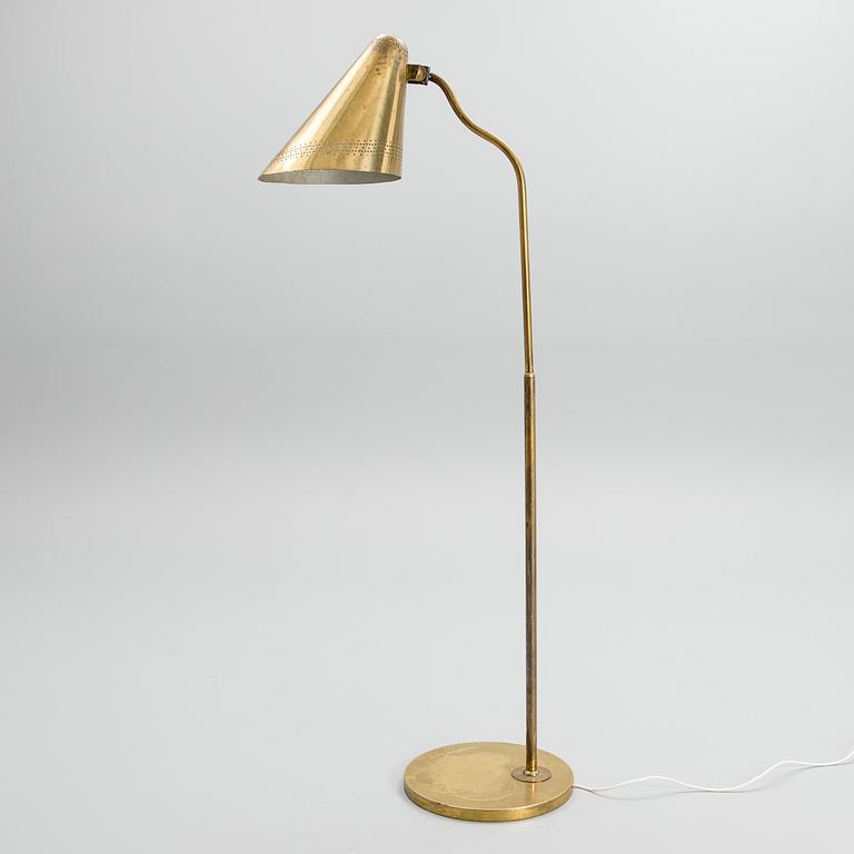 PAAVO TYNELL, A FLOOR LAMP. Domus Academica. Manufactured by Taito, 1947.