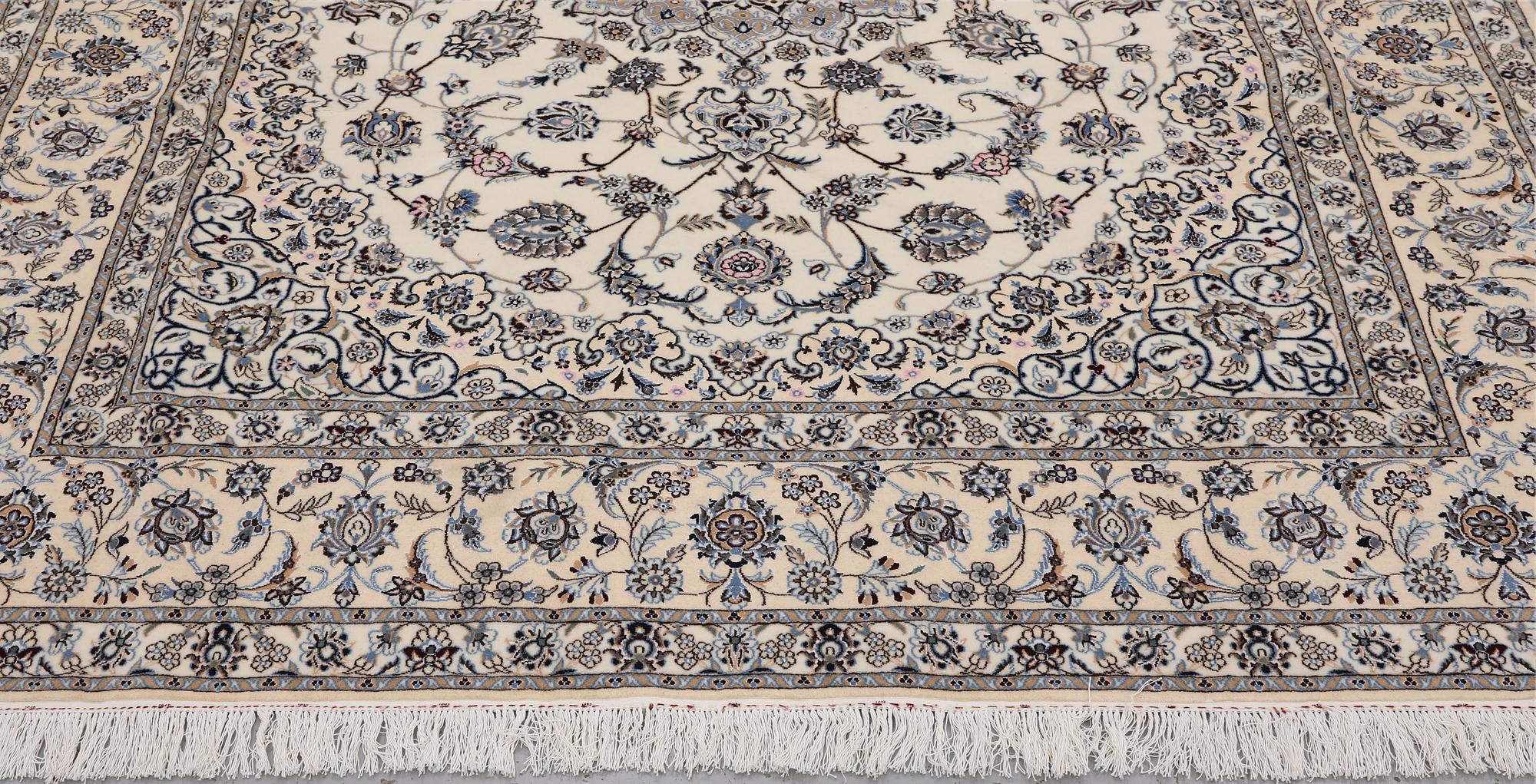 A Nain part silk carpet, 269 x 213 cm.
