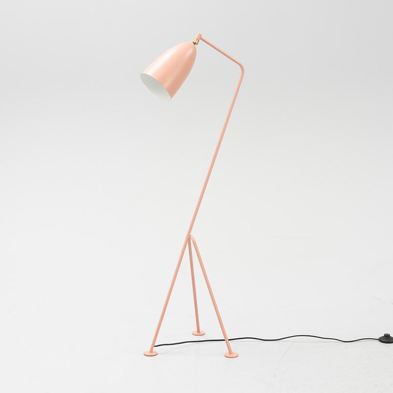 A 'Grasshopper' floorlamp by Greta Magnusson Grossman for Gubi.