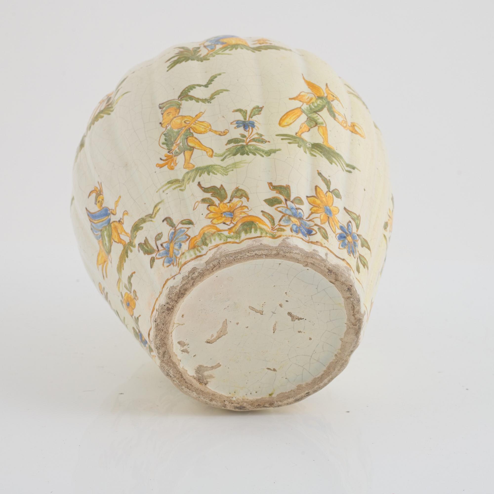 A faience pot, 18th century.