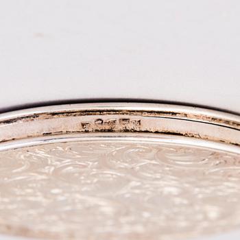 Two silver evening bags and a silver mirror, 1920s-1940s.