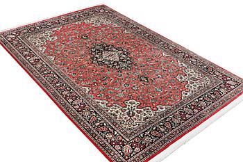 A silk Quum carpet, c. 305 x 205 cm.