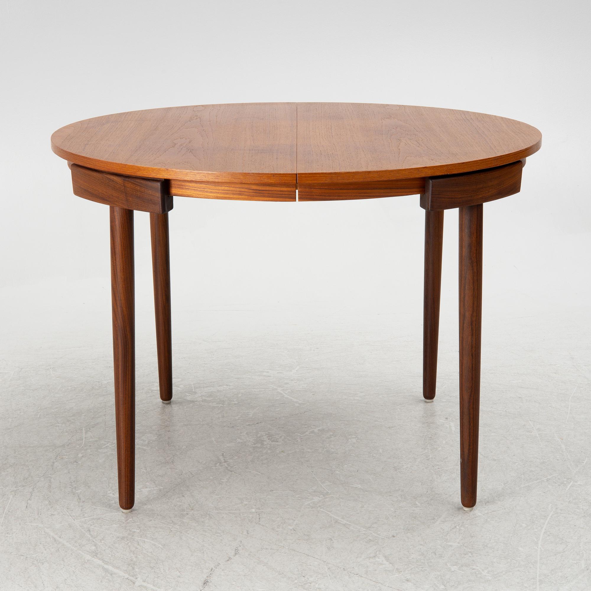 Hans Olsen, a dining table and four chairs, Frem Røjle, Denmark, 1950's.