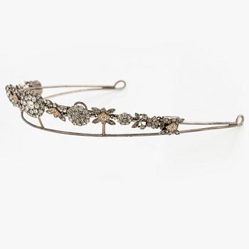 A silver and paste demi parure comprising a tiara and a pair of earrings, 19th century.